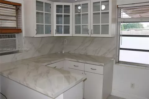Kitchen - 971 E 18th St, Hialeah, FL 33013 photo 5 of 7