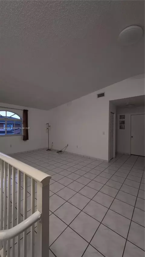 Living - 6873 W 36th Ave #202, Hialeah, FL 33018 photo 1 of 2