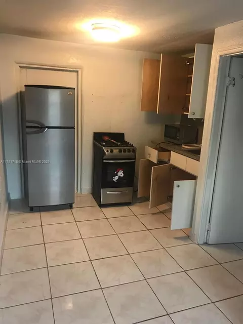 Kitchen - 825 E 9th Ln, Hialeah, FL 33010 photo 1 of 1
