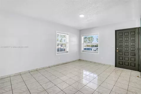 Living - 280 E 39th St, Hialeah, FL 33013 photo 3 of 6