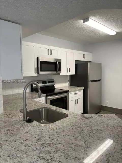 8701 Wiles Rd #103, Coral Springs, FL 33067