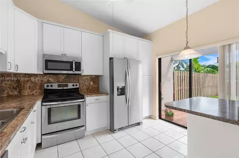 Kitchen - 5145 E Lakes Dr, Pompano Beach, FL 33064 photo 3 of 3