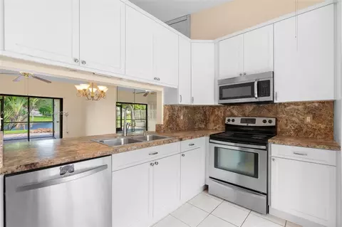 Kitchen - 5145 E Lakes Dr, Pompano Beach, FL 33064 photo 1 of 3