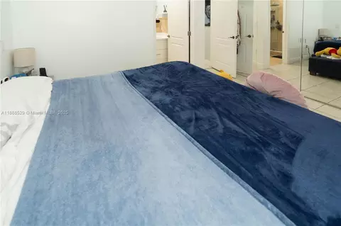 Bedroom - 298 E 3rd St #102, Hialeah, FL 33010 photo 8 of 9