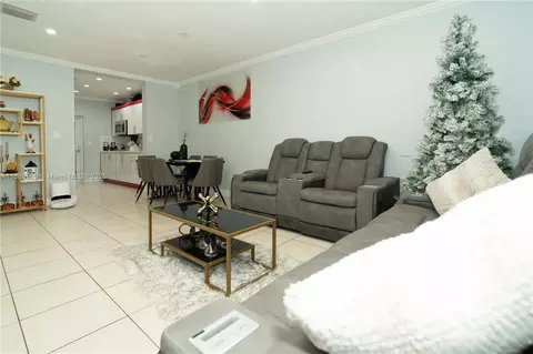 Living - 298 E 3rd St #102, Hialeah, FL 33010 photo 1 of 3