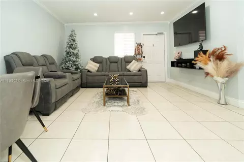 Living - 298 E 3rd St #102, Hialeah, FL 33010 photo 3 of 3
