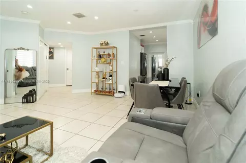 Living - 298 E 3rd St #102, Hialeah, FL 33010 photo 2 of 3
