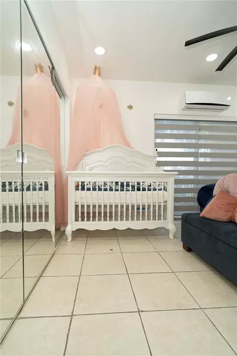 Bedroom - 298 E 3rd St #102, Hialeah, FL 33010 photo 7 of 9