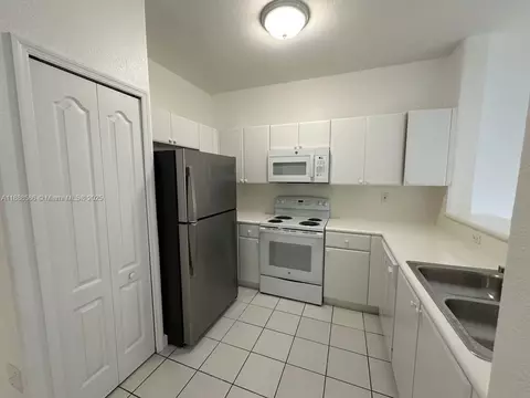 Kitchen - 2524 SE 16th Rd #102, Homestead, FL 33035 photo 1 of 3