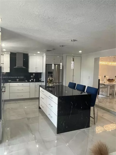 Kitchen - 390 E 53rd St, Hialeah, FL 33013 photo 2 of 3