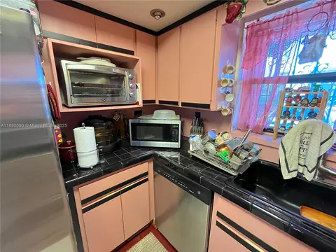 Kitchen - 1320 W 71st St, Hialeah, FL 33014 photo 3 of 4