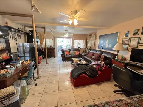 Living - 1320 W 71st St, Hialeah, FL 33014 photo 2 of 2