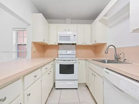 Kitchen - 911 E 14th Pl, Hialeah, FL 33010 photo 2 of 5