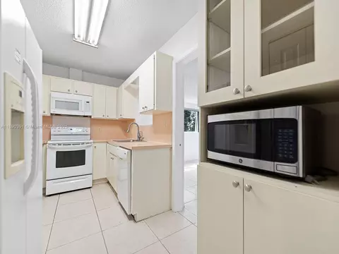 Kitchen - 911 E 14th Pl, Hialeah, FL 33010 photo 1 of 5
