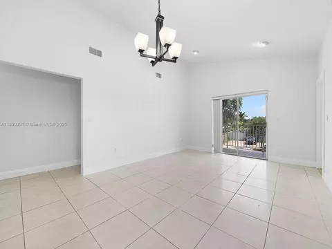 Living - 911 E 14th Pl, Hialeah, FL 33010 photo 2 of 3