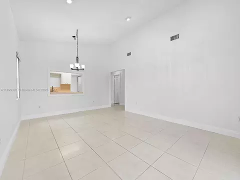 Living - 911 E 14th Pl, Hialeah, FL 33010 photo 1 of 3