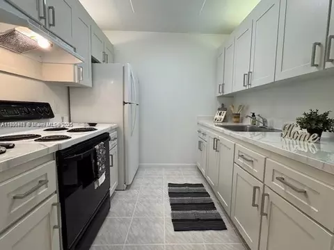 13450 SW 3rd St #209D, Pembroke Pines, FL 33027