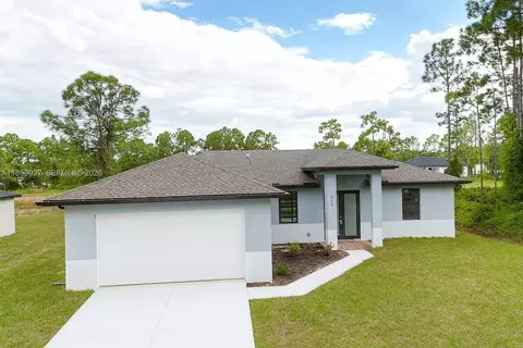 612 Ames St E, Lehigh Acres, FL 33974