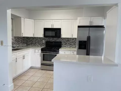 Kitchen - 3831 W 4th Ct, Hialeah, FL 33012 photo 1 of 3
