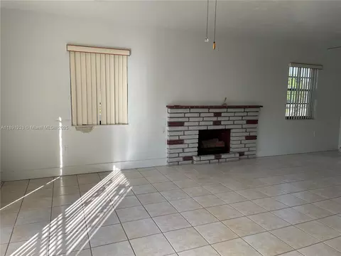 Living - 3831 W 4th Ct, Hialeah, FL 33012 photo 2 of 2