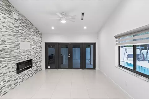 Living - 9182 NW 148th St, Miami Lakes, FL 33018 photo 6 of 7