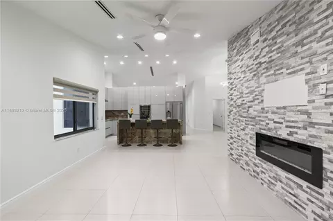 Living - 9182 NW 148th St, Miami Lakes, FL 33018 photo 5 of 7