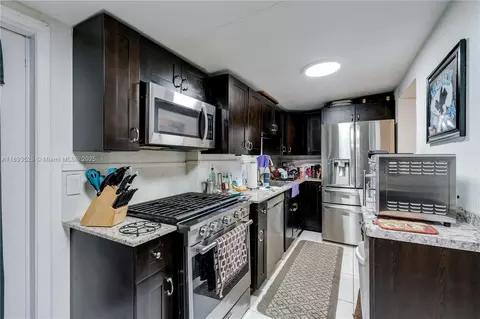 Kitchen - 940 E 21st St, Hialeah, FL 33013 photo 1 of 3