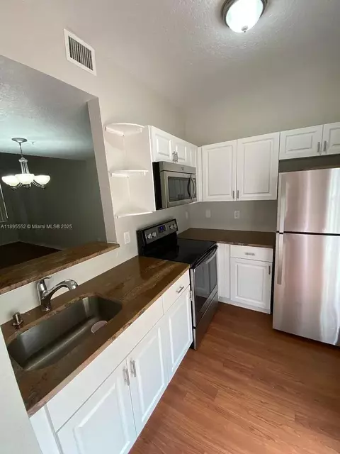 Kitchen - 77 E 4th St #A106, Hialeah, FL 33010 photo 1 of 4