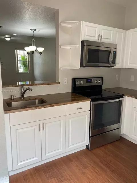 Kitchen - 77 E 4th St #A106, Hialeah, FL 33010 photo 2 of 4