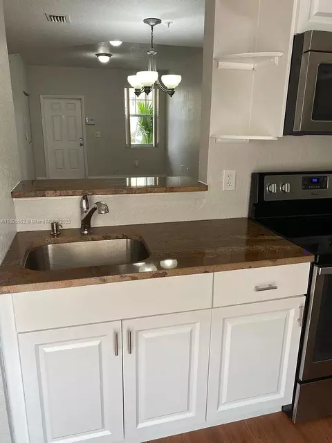 Kitchen - 77 E 4th St #A106, Hialeah, FL 33010 photo 4 of 4