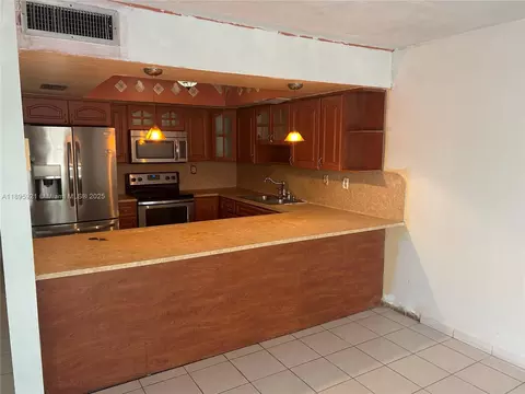 Kitchen - 7090 W 2nd Ct, Hialeah, FL 33014 photo 1 of 2