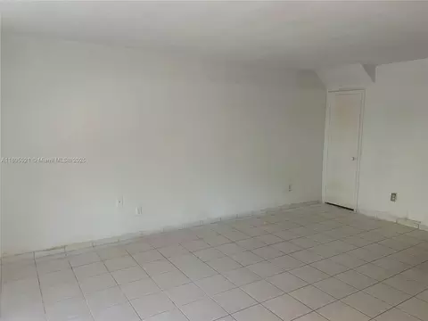 Living - 7090 W 2nd Ct, Hialeah, FL 33014 photo 2 of 2