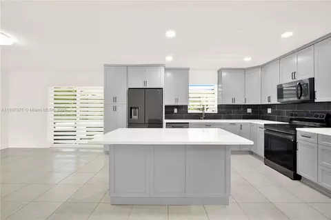 Kitchen - 18320 SW 293rd St, Homestead, FL 33030 photo 1 of 2