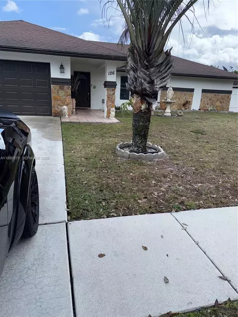 126 Sunflower Cir, Royal Palm Beach, FL 33411