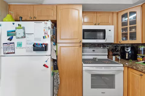 Kitchen - 7144 W 2nd Ln, Hialeah, FL 33014 photo 2 of 3