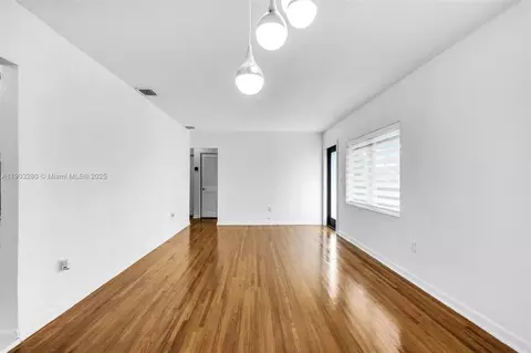 Living - 175 W 56th St, Hialeah, FL 33012 photo 3 of 4