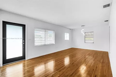 Living - 175 W 56th St, Hialeah, FL 33012 photo 2 of 4