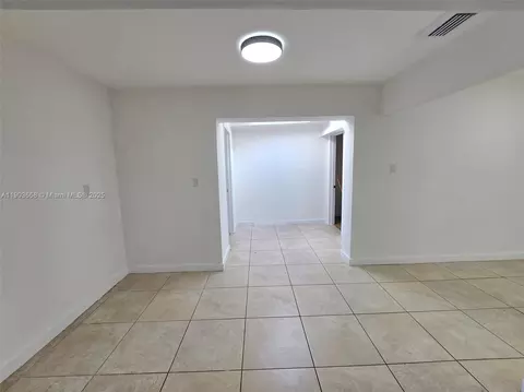 Living - 7770 W 8th Ave, Hialeah, FL 33014 photo 3 of 4