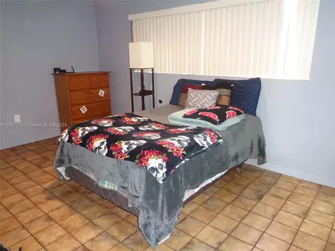 Bedroom - 385 E 56th St, Hialeah, FL 33013 photo 10 of 11