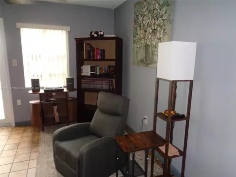 Living - 385 E 56th St, Hialeah, FL 33013 photo 7 of 8