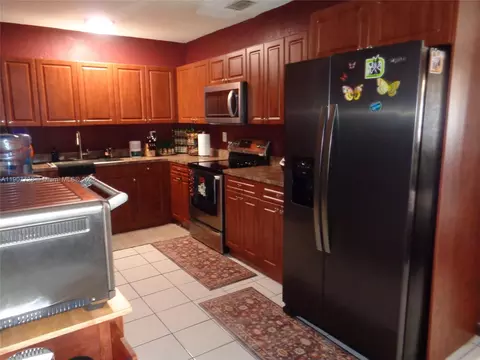 Kitchen - 385 E 56th St, Hialeah, FL 33013 photo 2 of 2