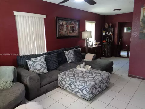 Living - 385 E 56th St, Hialeah, FL 33013 photo 3 of 8