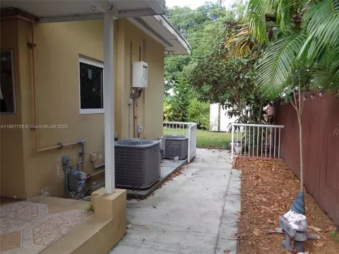 Exterior - 385 E 56th St, Hialeah, FL 33013 photo 13 of 21