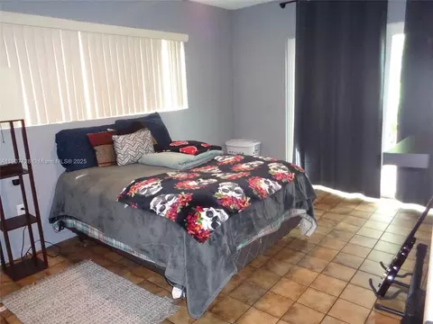 Bedroom - 385 E 56th St, Hialeah, FL 33013 photo 9 of 11