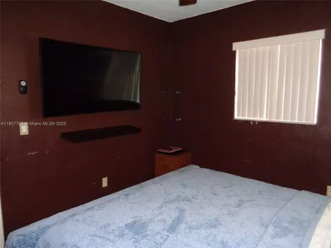 Bedroom - 385 E 56th St, Hialeah, FL 33013 photo 5 of 11