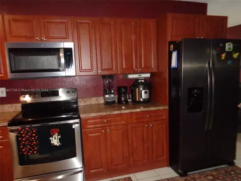 Kitchen - 385 E 56th St, Hialeah, FL 33013 photo 1 of 2