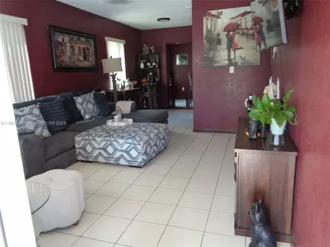 Living - 385 E 56th St, Hialeah, FL 33013 photo 2 of 8