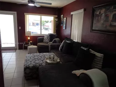 Living - 385 E 56th St, Hialeah, FL 33013 photo 4 of 8