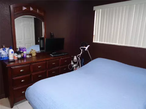 Bedroom - 385 E 56th St, Hialeah, FL 33013 photo 6 of 11