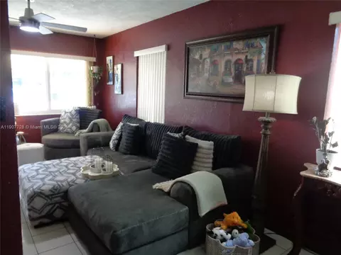Living - 385 E 56th St, Hialeah, FL 33013 photo 5 of 8